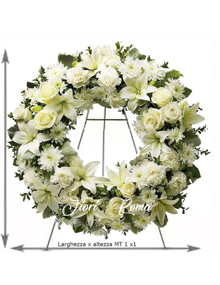 Funeral wreath of white flowers with roses and lilies