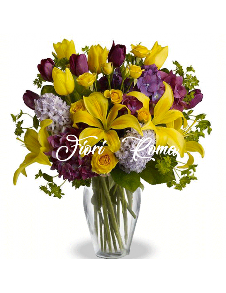 The Romantic Bouquet is composed of purple flowers and yellow lilies